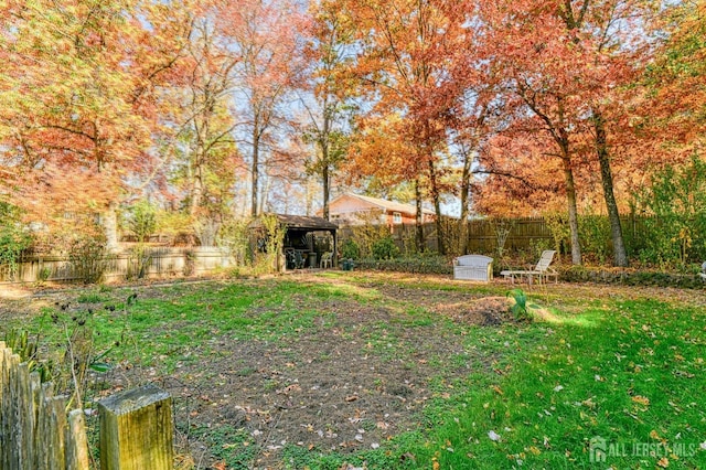 815 Marlboro Rd, Old Bridge, NJ 08857 - fenced backyard with a storage unit