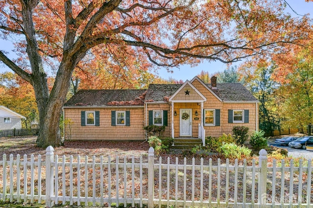815 Marlboro Rd, Old Bridge, NJ 08857 - view of front of home with a chimney and a fenced front yard