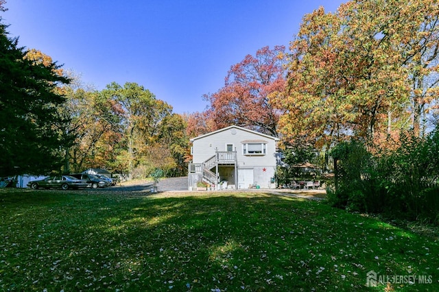 view of outdoor structure featuring stairs