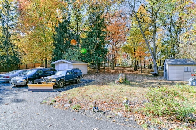 815 Marlboro Rd, Old Bridge, NJ 08857 - view of yard with a storage unit and view of wooded area