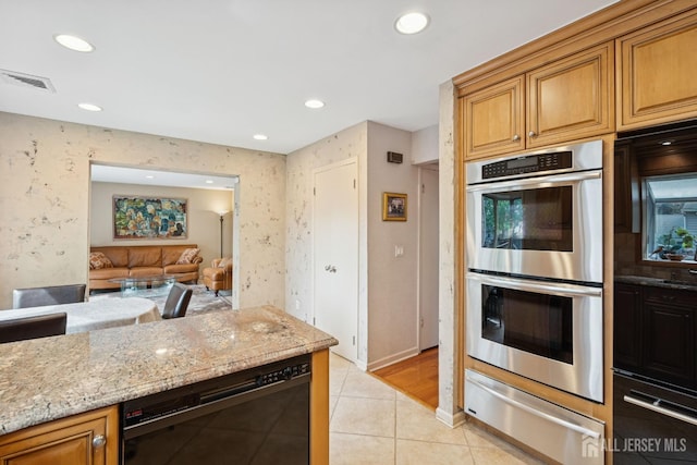 kitchen featuring light tile patterned flooring, stainless steel double oven, visible vents, dishwasher, and a warming drawer