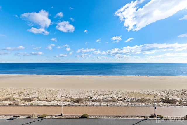 property view of water featuring a view of the beach