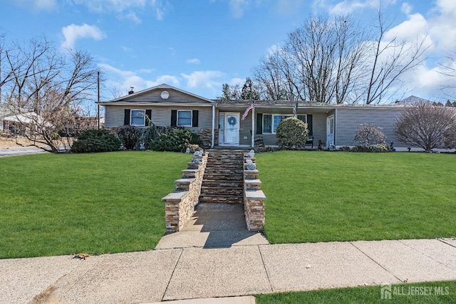 view of front of house with a chimney and a front lawn