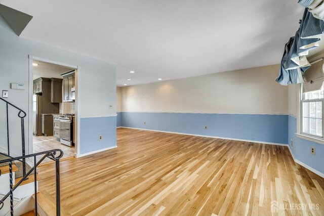 unfurnished room featuring light hardwood / wood-style floors