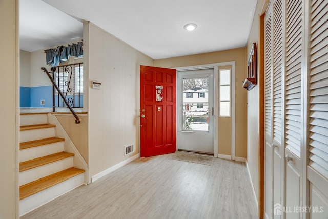 entrance foyer featuring light hardwood / wood-style floors