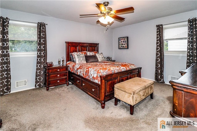 carpeted bedroom featuring ceiling fan