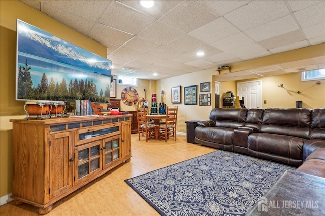 11 Cardinal Ct, Old Bridge, NJ 08857 - living room featuring light wood-style floors, a paneled ceiling, and baseboards