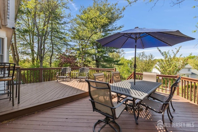 11 Cardinal Ct, Old Bridge, NJ 08857 - wooden deck featuring outdoor dining area