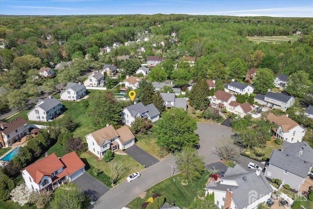 11 Cardinal Ct, Old Bridge, NJ 08857 - aerial overview of property's location with a heavily wooded area and nearby suburban area