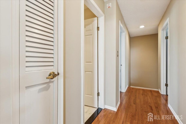 11 Cardinal Ct, Old Bridge, NJ 08857 - hall with light wood-style floors, baseboards, and recessed lighting