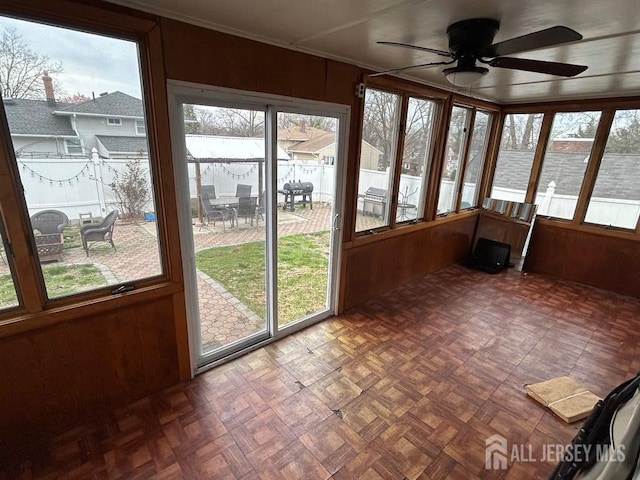 803 W Inman Ave W, Rahway, NJ 07065 - unfurnished sunroom with wooden walls and ornamental molding