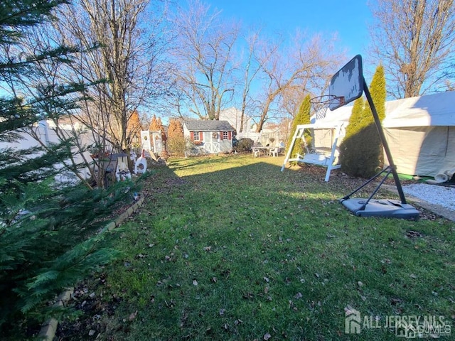 466 W Ave, Sewaren, NJ 07077 - view of green lawn featuring an outdoor structure