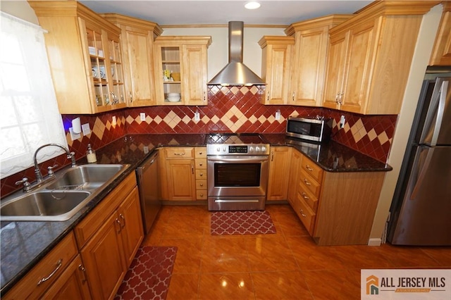 25 Clover Ave, Colonia, NJ 07067 - kitchen with appliances with stainless steel finishes, wall chimney range hood, a sink, tile patterned flooring, and glass insert cabinets