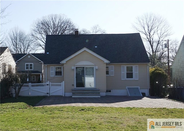 25 Clover Ave, Colonia, NJ 07067 - view of front of house with entry steps, a gate, a patio, and a chimney