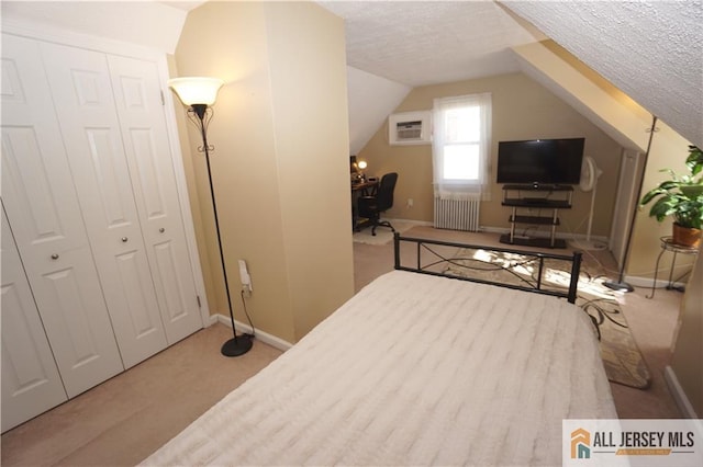 25 Clover Ave, Colonia, NJ 07067 - bedroom featuring radiator, carpet floors, baseboards, a textured ceiling, and lofted ceiling