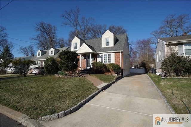 25 Clover Ave, Colonia, NJ 07067 - cape cod home with brick siding and a front yard
