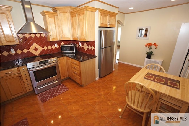25 Clover Ave, Colonia, NJ 07067 - kitchen featuring wall chimney exhaust hood, appliances with stainless steel finishes, tasteful backsplash, ornamental molding, and baseboards