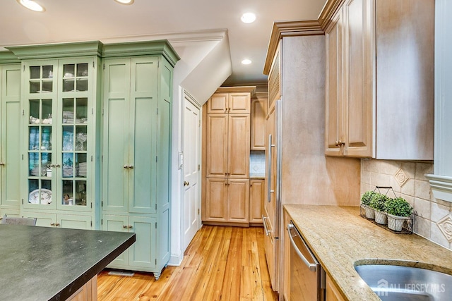 44 Rector St, Metuchen, NJ 08840 - kitchen with stainless steel dishwasher, light wood-style flooring, decorative backsplash, green cabinetry, and recessed lighting