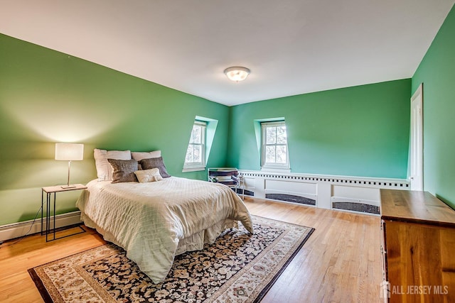 44 Rector St, Metuchen, NJ 08840 - bedroom featuring wood finished floors and baseboard heating