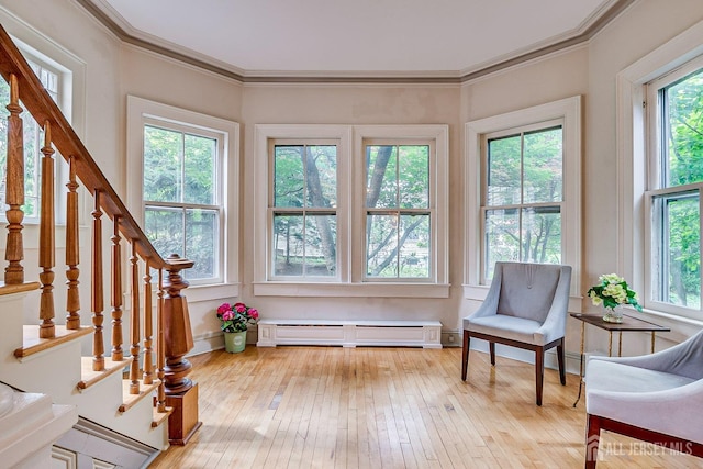 44 Rector St, Metuchen, NJ 08840 - sitting room with a baseboard radiator, stairway, light wood-type flooring, and ornamental molding
