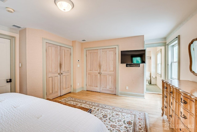 44 Rector St, Metuchen, NJ 08840 - bedroom with light wood-type flooring, multiple closets, and baseboards