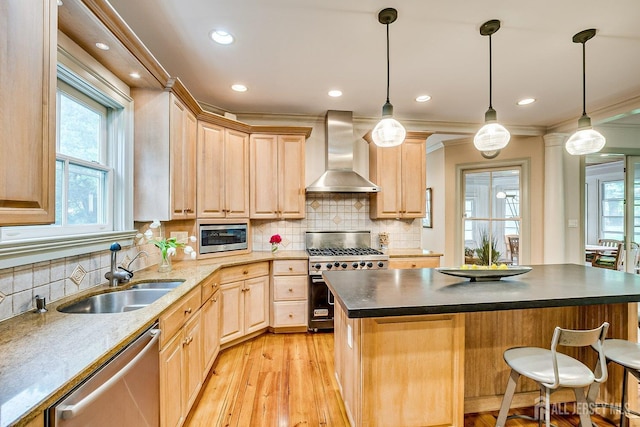 44 Rector St, Metuchen, NJ 08840 - kitchen with wall chimney exhaust hood, a sink, stainless steel appliances, light brown cabinetry, and light wood-style floors