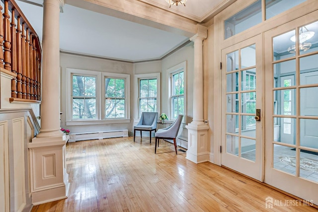 44 Rector St, Metuchen, NJ 08840 - sitting room with ornate columns, baseboard heating, ornamental molding, and wood-type flooring
