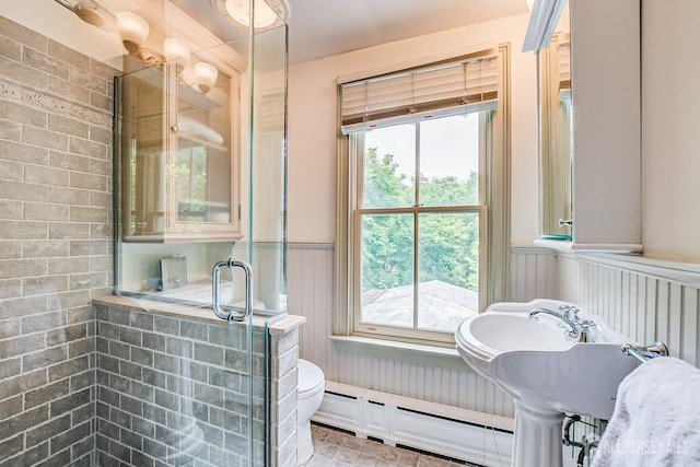 44 Rector St, Metuchen, NJ 08840 - bathroom with a wainscoted wall, a stall shower, toilet, and a baseboard radiator