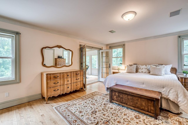 44 Rector St, Metuchen, NJ 08840 - bedroom featuring access to exterior, light wood finished floors, and baseboards