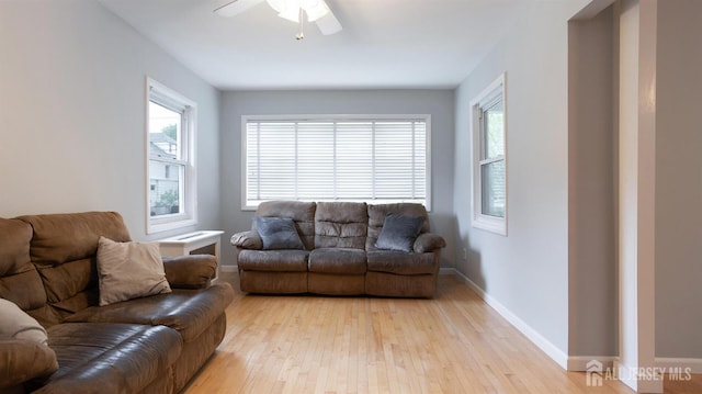 41 Ross Hall Blvd N, Piscataway, NJ 08854 - living room with light wood-type flooring, ceiling fan, and baseboards