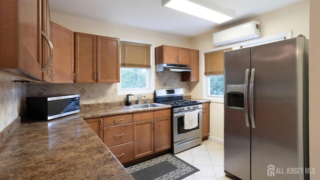 41 Ross Hall Blvd N, Piscataway, NJ 08854 - kitchen with appliances with stainless steel finishes, under cabinet range hood, a sink, a wall mounted air conditioner, and healthy amount of natural light