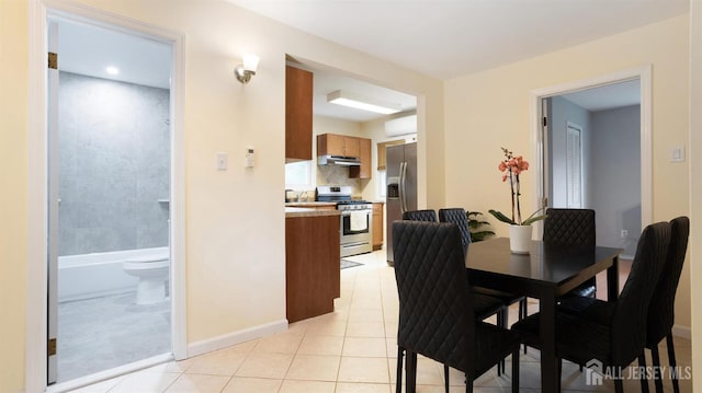 41 Ross Hall Blvd N, Piscataway, NJ 08854 - dining room with light tile patterned flooring and baseboards