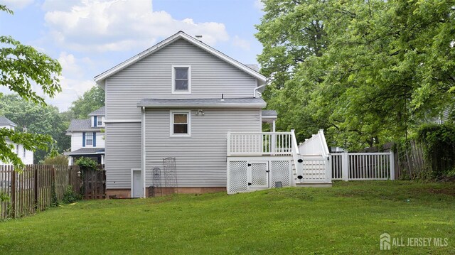 41 Ross Hall Blvd N, Piscataway, NJ 08854 - rear view of property featuring a wooden deck