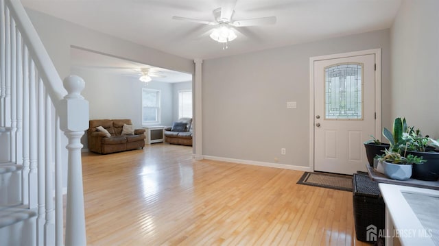 41 Ross Hall Blvd N, Piscataway, NJ 08854 - foyer entrance featuring ceiling fan, light wood-style flooring, and baseboards