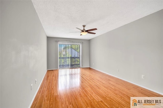 22 Witch Hazel Ct, South Brunswick, NJ 08852 - unfurnished room with a ceiling fan, a textured ceiling, and light wood-style floors