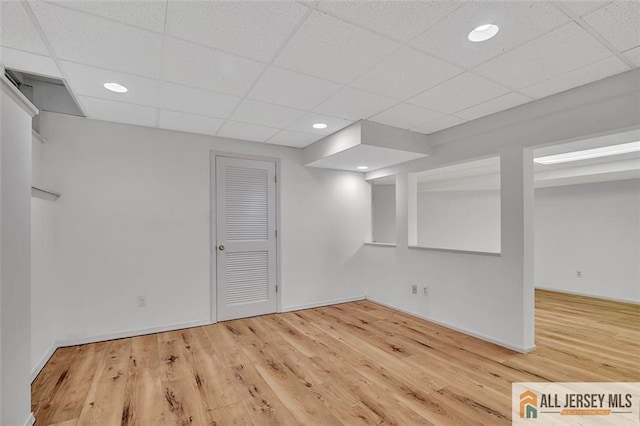 22 Witch Hazel Ct, South Brunswick, NJ 08852 - finished basement with a paneled ceiling, wood finished floors, and recessed lighting