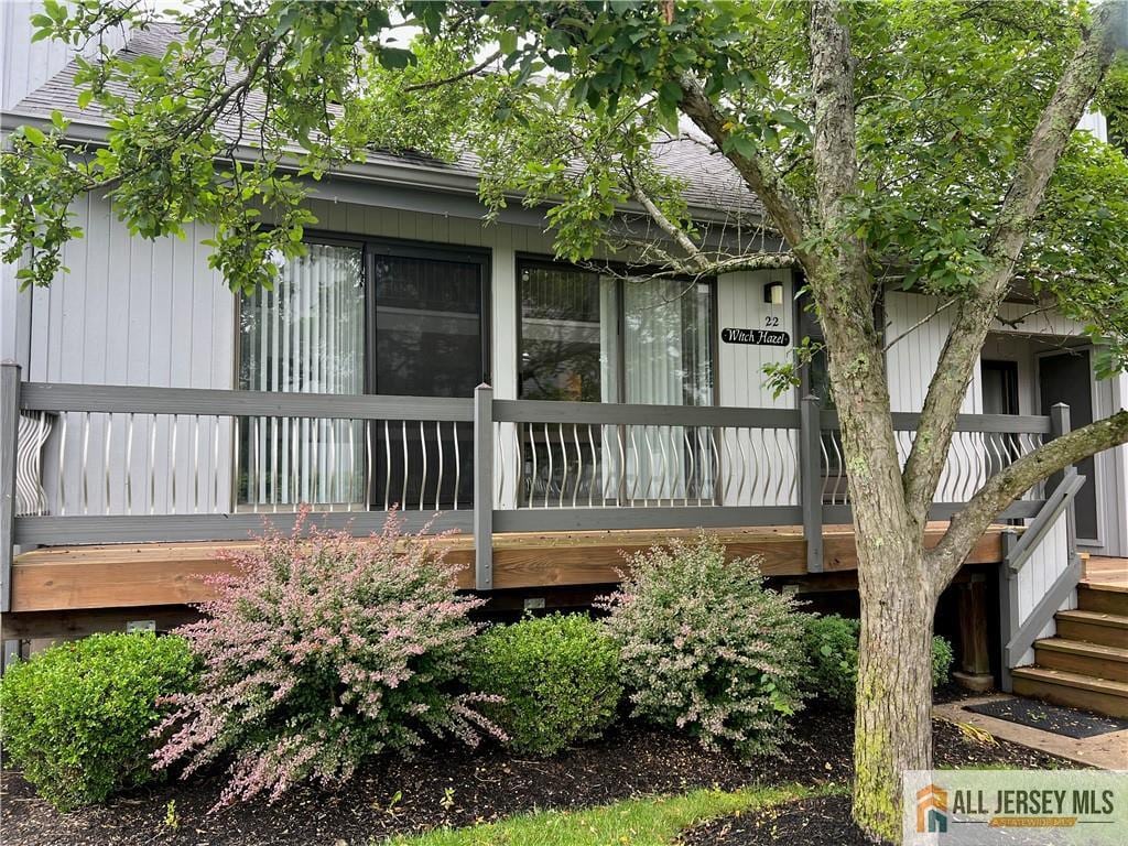 22 Witch Hazel Ct, South Brunswick, NJ 08852 - view of side of home with roof with shingles