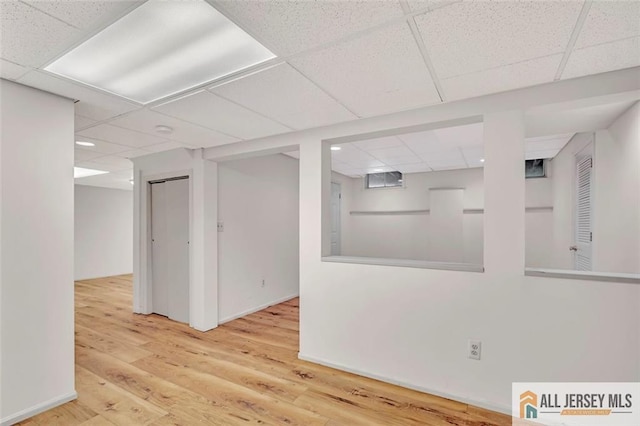 22 Witch Hazel Ct, South Brunswick, NJ 08852 - unfurnished room featuring a paneled ceiling, wood finished floors, and recessed lighting