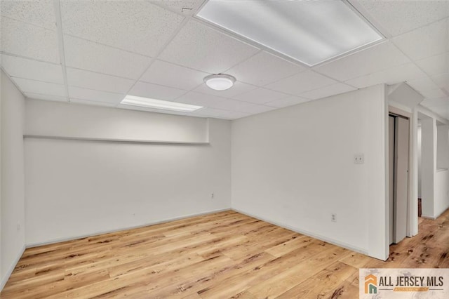 22 Witch Hazel Ct, South Brunswick, NJ 08852 - finished below grade area with a drop ceiling and wood finished floors