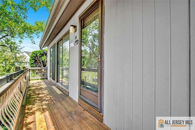 22 Witch Hazel Ct, South Brunswick, NJ 08852 - view of wooden balcony with a wooden deck