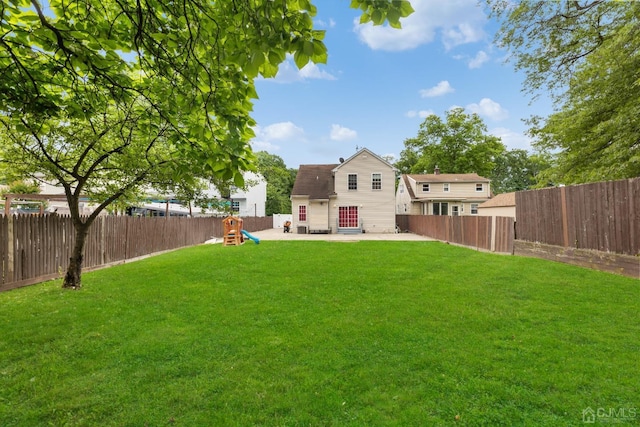 view of yard with a playground