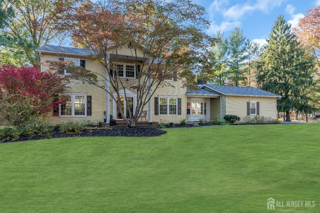 view of front of house with a front yard