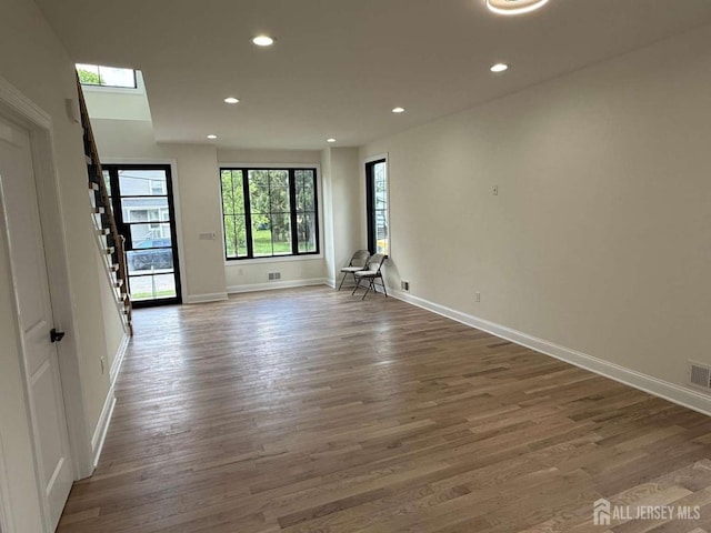 26 Morse Ave, Edison, NJ 08817 - spare room with stairway, recessed lighting, wood finished floors, and baseboards