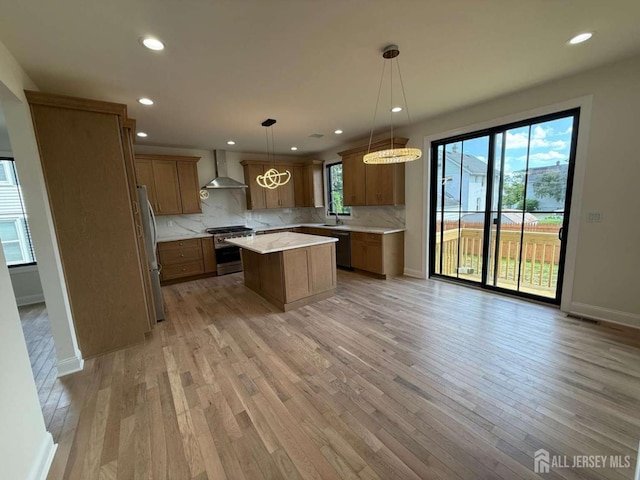 26 Morse Ave, Edison, NJ 08817 - kitchen with wall chimney exhaust hood, high end range, dishwashing machine, a center island, and tasteful backsplash