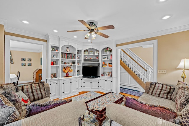 living area with baseboard heating, a ceiling fan, light wood finished floors, recessed lighting, and stairway