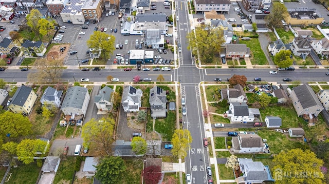aerial view of property's location featuring nearby suburban area and property parcel outlined