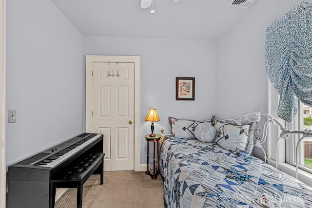 bedroom with carpet floors and a ceiling fan