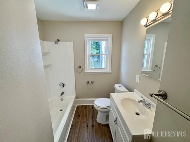 1154 Foster Ave, South Plainfield, NJ 07080 - bathroom featuring wood finished floors, vanity, and tub / shower combination
