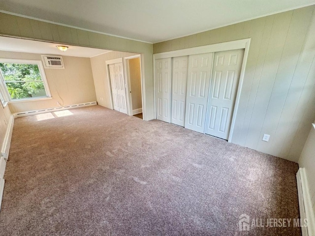 1154 Foster Ave, South Plainfield, NJ 07080 - unfurnished bedroom with a baseboard radiator, carpet, crown molding, an AC wall unit, and a baseboard heating unit