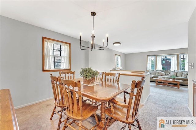 323 Green St, Woodbridge Proper, NJ 07095 - dining area with a chandelier and light colored carpet